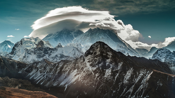 Mountains Covered In Snow Clouds 4k Wallpaper