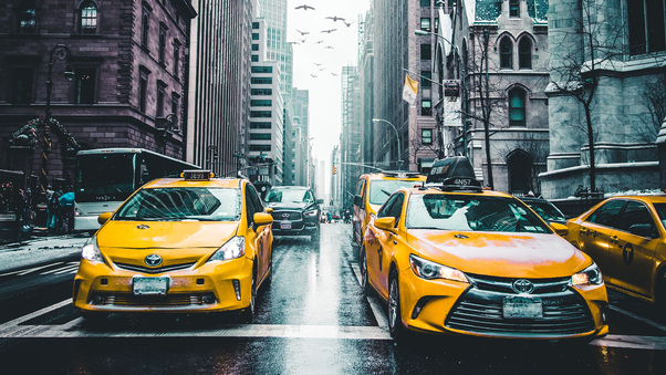 New York Taxi Wet Roads Tall Buildings 5k Wallpaper