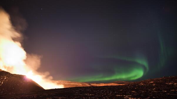 Northern Lights Over The Fagradalsfjall Volcanic Eruption In Geldingadalur In Iceland 5k Wallpaper