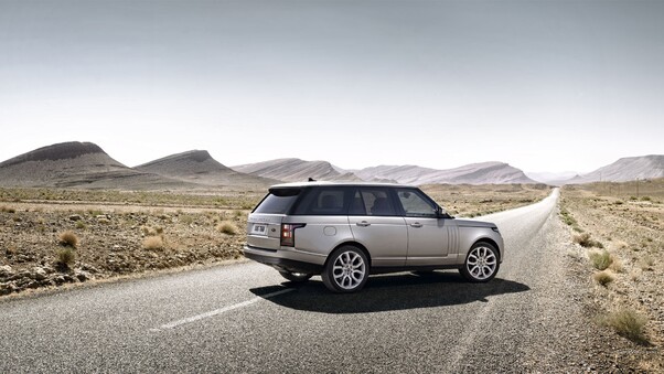 Range Rover On Alone Road Wallpaper