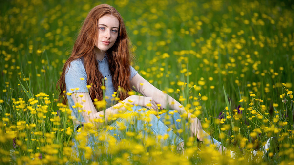 Redhead Girl Sitting Glance Grassland 5k Wallpaper