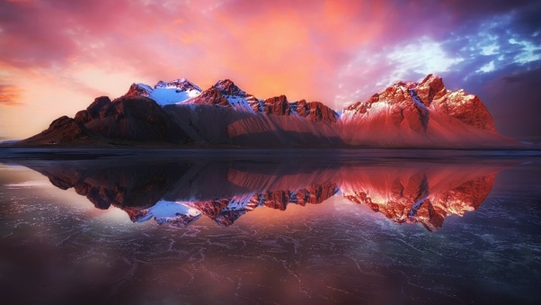 Reflection Of Mountains In Water Wallpaper