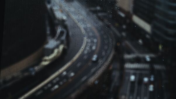 Road Highway Through Rainy Drops Glass Wallpaper