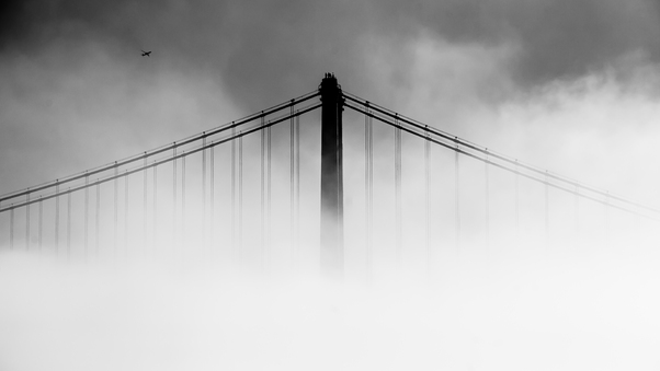 San Francisco Oakland Bay Bridge Covered With Fog Wallpaper