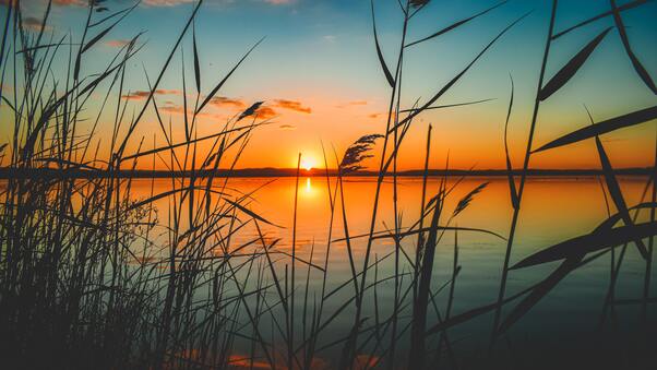 Scenic View Of Lake During Sunset 5k Wallpaper