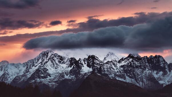 Snow Covered Mountains Clouds Over It 5k Wallpaper