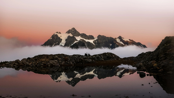 Snowy Mountains And Still Water Wallpaper