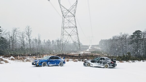 Snowy Subarus Car Wallpaper