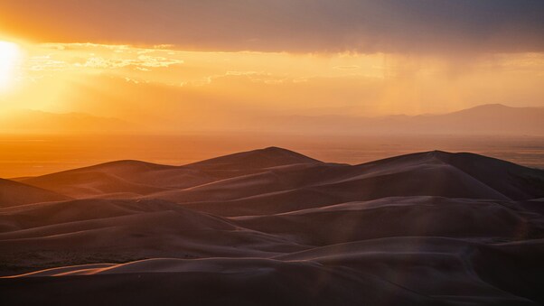 Sun Is Setting Over The Sand Dunes Wallpaper