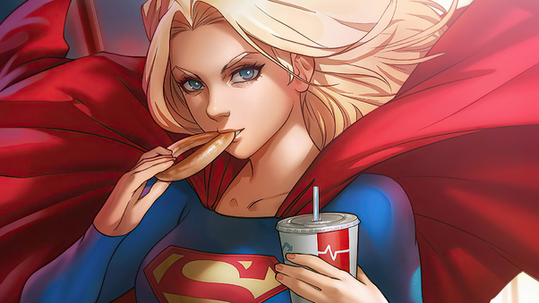 Supergirl Eating Cookie Wallpaper