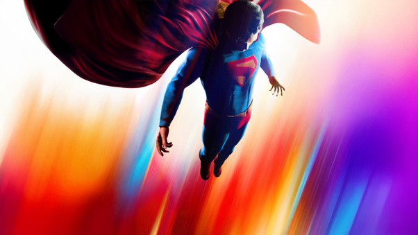 Superman Flying Over The Skyline Wallpaper