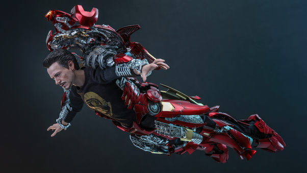 Tony Stark Suits Up As Iron Man Wallpaper