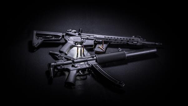 two-black-assault-rifles-5k-g0.jpg