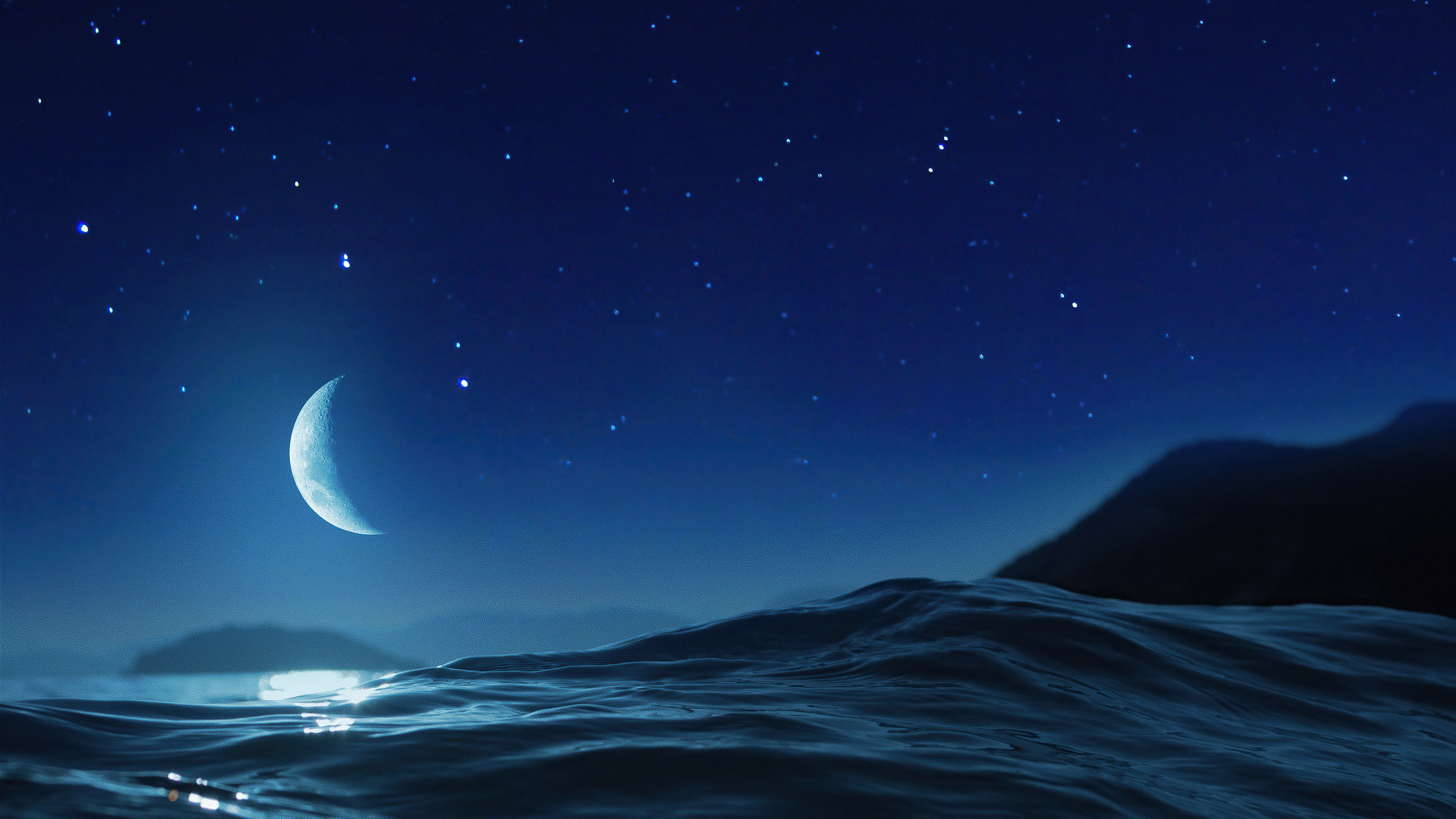 ocean at night with moon