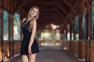 Blonde Girl In Black Dress (320x240) Resolution Wallpaper