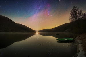 Boat Sitting On Top Of A Lake Under A Night Sky (1920x1080) Resolution Wallpaper