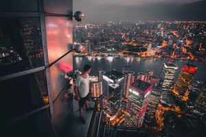 Boy Standing On The Rooftop Of Building Looking Down 5k (2048x2048) Resolution Wallpaper