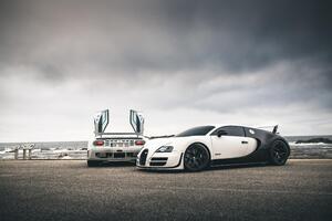 Bugatti Veyron SS And EB110SS By The Sea 5k (1336x768) Resolution Wallpaper