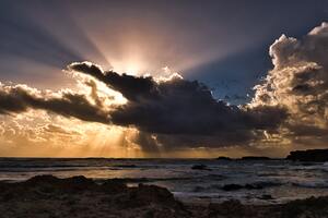 Clouds Sun Rays Passing Ocean 5k (1336x768) Resolution Wallpaper