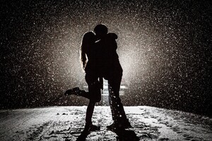 Couple Kissing In Snow Night