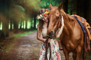 Cute Girl Smiling With Horse Outdoors