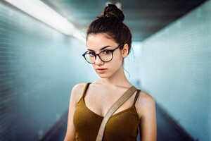 Delaia Gonzalez In Glasses Subway (2048x1152) Resolution Wallpaper