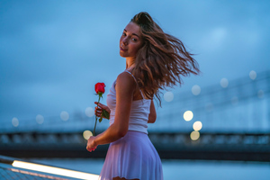 Girl Holding Rose Looking Back 5k