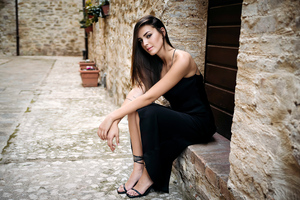 Girl In Black Dress On Streets Of Italy Wallpaper
