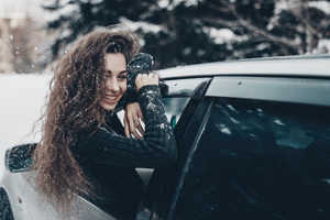 Girl In Snow Coming Out Of Car Window (1280x1024) Resolution Wallpaper