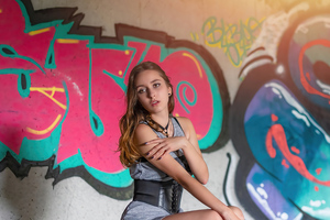 Girl Sitting Graffiti Wall 4k Wallpaper