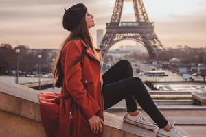 Girl Sitting On Rooftop Eiffel Tower In Back (1336x768) Resolution Wallpaper