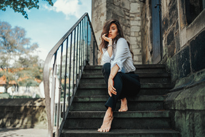 Girl Sitting On Stairs Hands On Chin 5k Wallpaper