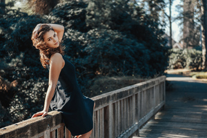 Girl Sitting On Wooden Bridge Looking Back (1366x768) Resolution Wallpaper