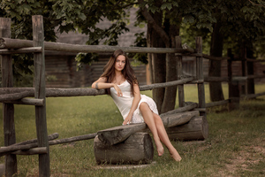 Girl Sitting On Wooden Fence Bench Wallpaper