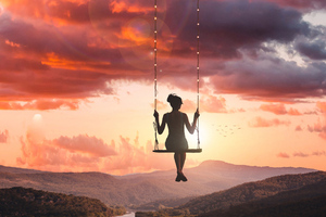 Girl Swinging On Top Of World (2560x1440) Resolution Wallpaper