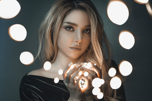 Girl With Lights In Hands (320x240) Resolution Wallpaper