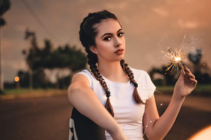 Girl With Sparklers In Hand (1336x768) Resolution Wallpaper
