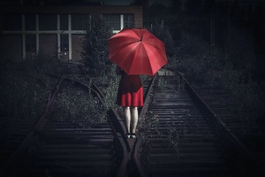 Girl With Umbrella On The Railway