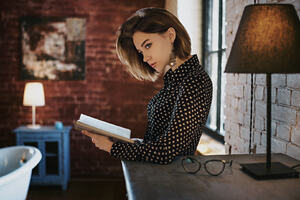Gorgeous Girl With Book Looking Away