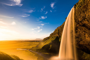 Iceland Waterfall Sunset Veil Over Cliffs (1280x720) Resolution Wallpaper