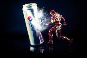 Iron Man Kicking Pepsi Can (1366x768) Resolution Wallpaper