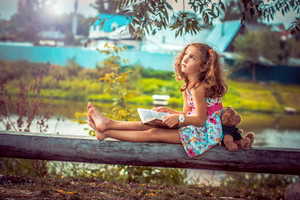 Little Girl Reading A Book (1280x800) Resolution Wallpaper