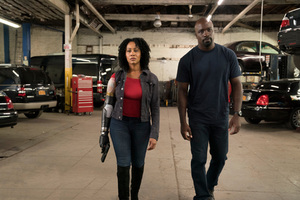 Luke Cage Misty Knight With Bionic Arm (1336x768) Resolution Wallpaper