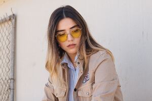 Model Outdoor Wearing Sunglasses (320x240) Resolution Wallpaper