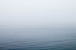 Ocean Under Fog (2560x1440) Resolution Wallpaper