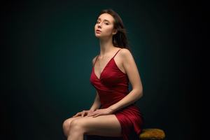 Red Dress Beautiful Girl Sitting On Table (1360x768) Resolution Wallpaper