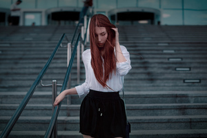 Redhead Girl Walking Down Stairs