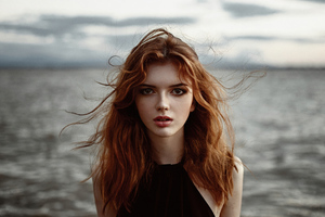 Redhead Model Wavy Hair Looking Directly