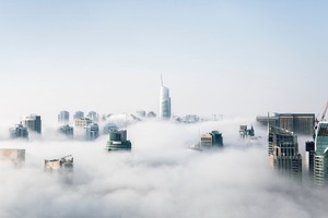 Skyscraper Buildings Covered In Fog