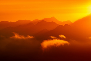 Sun Setting Over A Mountain Range Dark Evening (1680x1050) Resolution Wallpaper